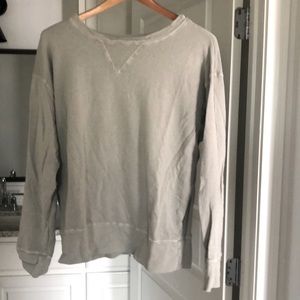 Crew neck tan sweatshirt.
